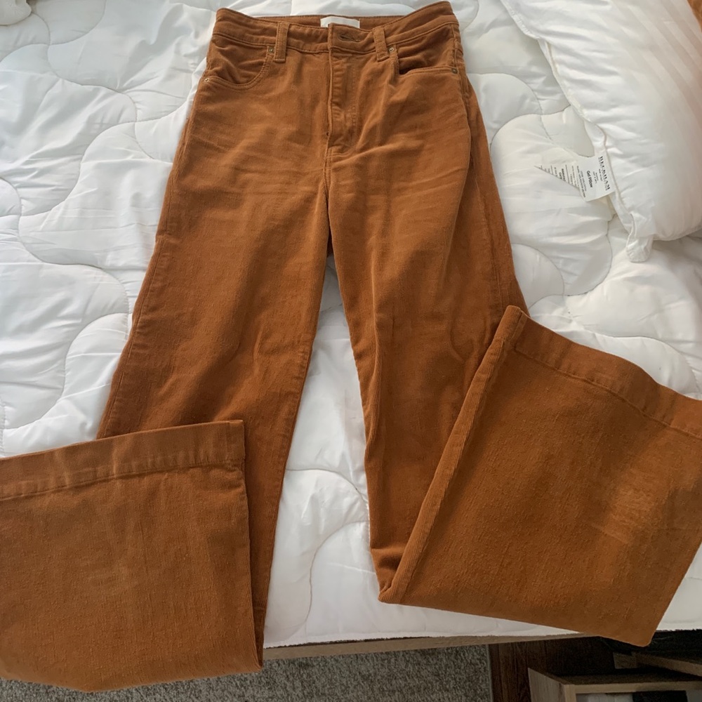 Burnt orange Rolla’s bell bottom corduroy jeans